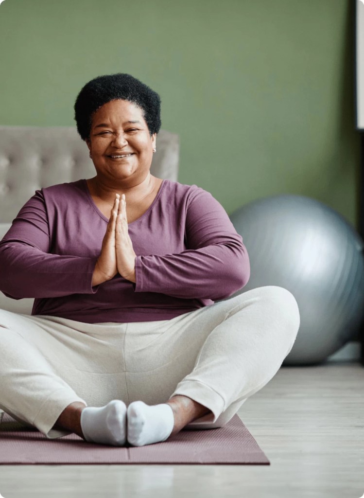 Women in meditation pose
