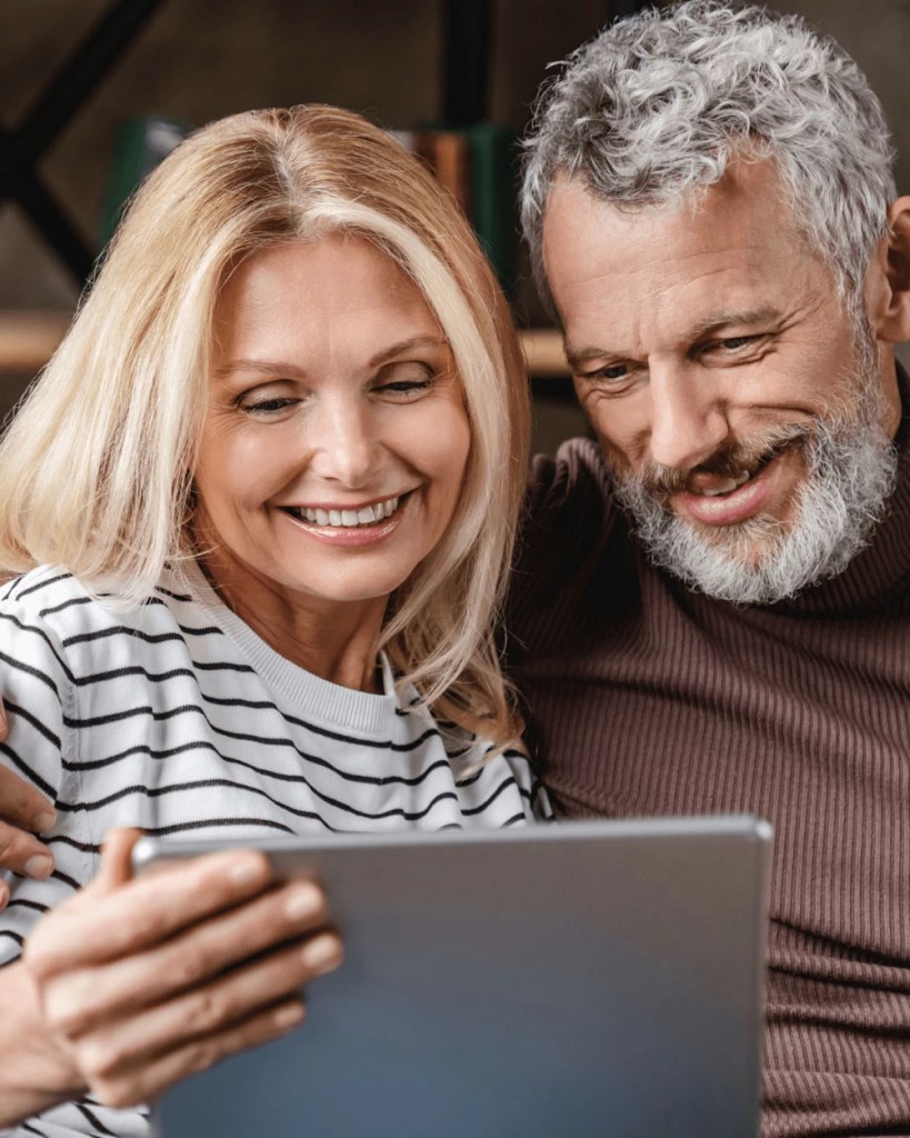 Man and women with tablet